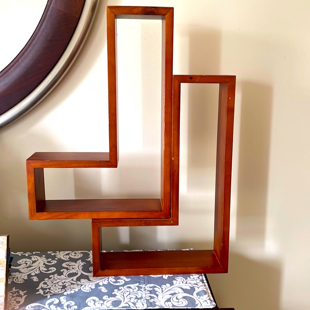 2 At Home America geometric shelves.  Dark wood color with hanging hardware.